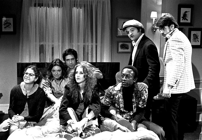 The original SNL cast members from the show's 1975 debut season are, from left, Gilda Radner, Jane Curtin, Chevy Chase, Laraine Newman, Garrett Morris, John Belushi and Dan Aykroyd.