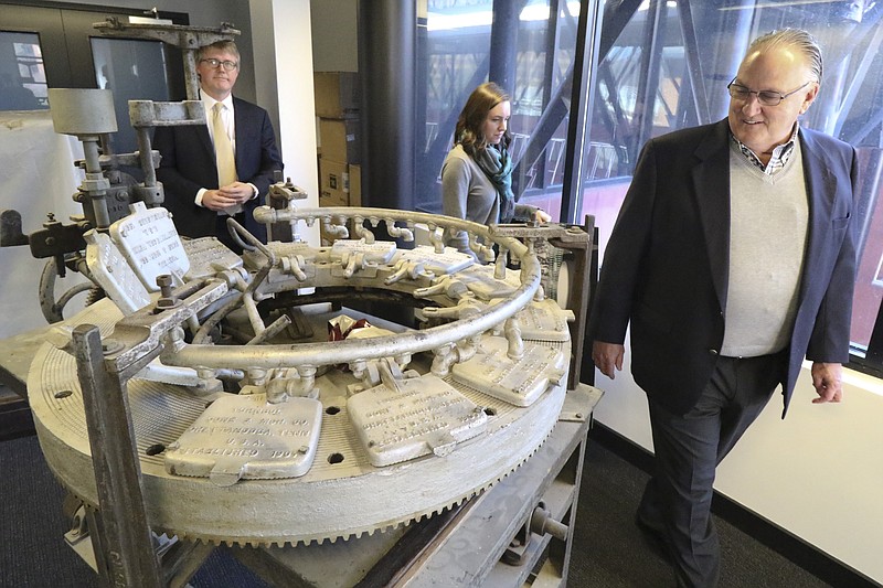 Daryl Black, Caroline Sunderland and Carl Henderson participate in a walking tour of the new Chattanooga History Center on Friday, January 15, 2015 which needs $4.2 million to open its doors. There is no opening date set as of yet. Black is the director of the CHC. 