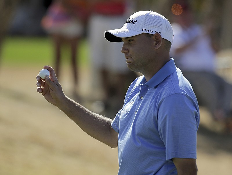
              Bill Haas reacts to his eagle on the sixth hole during the final round of the Humana Challenge golf tournament on the Palmer Private course at PGA West on Sunday, Jan. 25, 2015 in La Quinta, Calif. (AP Photo/Chris Carlson)
            