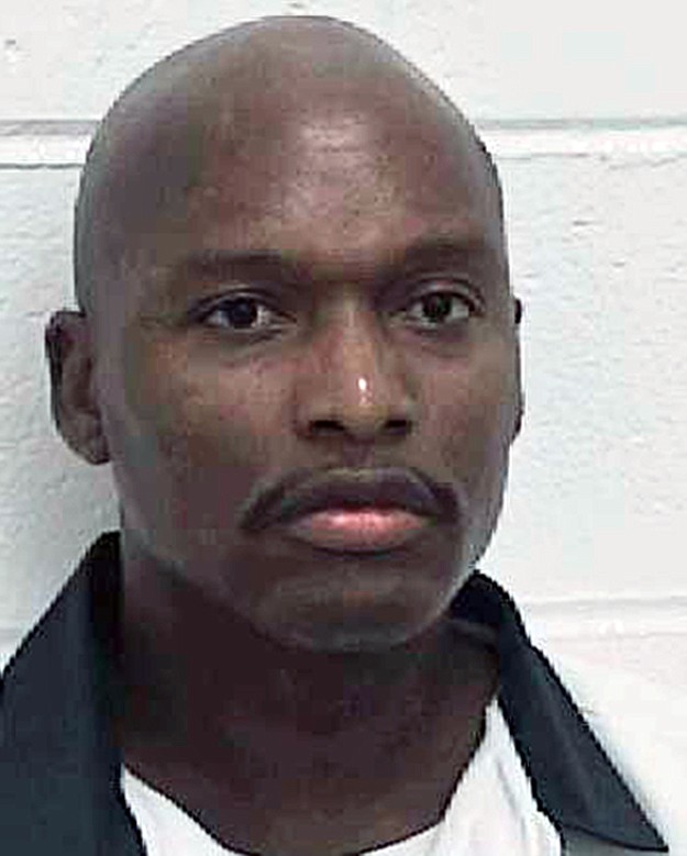 
              FILE - This undated file photo provided by the Georgia Department of Corrections shows convicted murderer Warren Lee Hill. The Georgia death row inmate who has come within hours of execution three times is once again scheduled for execution this week (AP Photo/Georgia Dept. of Corrections, File)
            