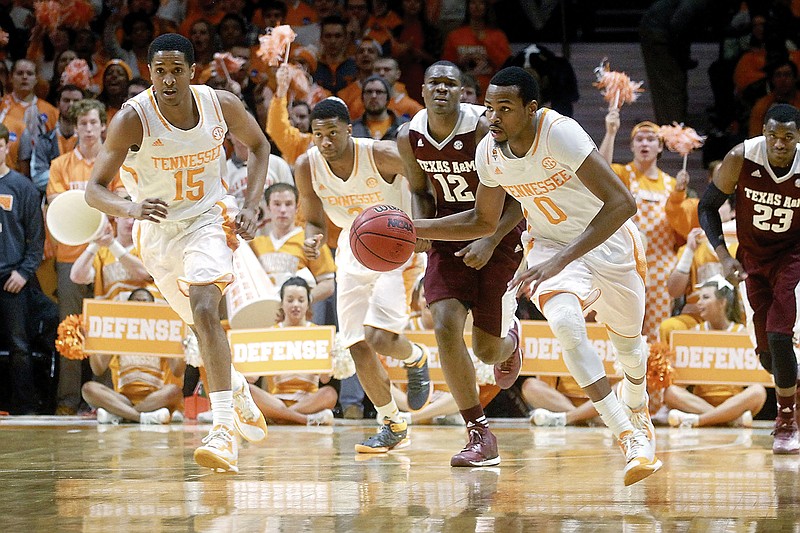 Tennessee's Kevin Punter (0) takes the ball down court during their game against Texas A&M on Jan. 24, 2015, at Thompson-Boling Arena in Knoxville.