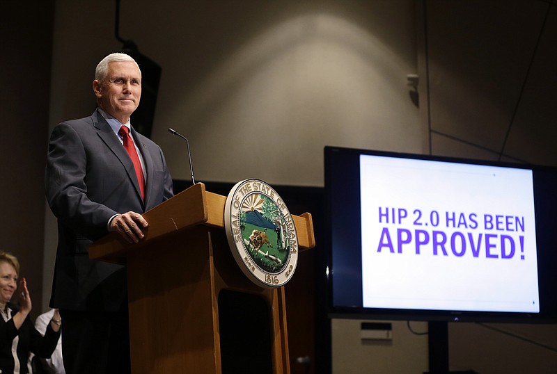 Indiana Gov. Mike Pence announces that the Centers for Medicaid and Medicare Services has approved the state's waiver request for the plan his administration calls HIP 2.0 during a speech in Indianapolis, Tuesday, Jan. 27, 2015.