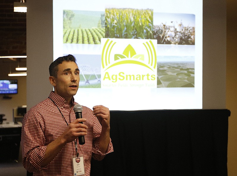 	Staff photo by Doug Strickland
Brett Norman with agricultural startup AgSmarts gives a presentation during the second day of The TENN roadshow on Tuesday, Jan. 27, 2015, at Coyote Logistics in Chattanooga. The roadshow, which began yesterday in Kingsport, showcases presentations by 10 startups selected by Launch Tennessee from around the state.