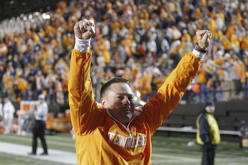The Volunteer's head coach Butch Jones celebrates his team's 24-17 win over the Commodores in this Nov. 29, 2014, photo. 