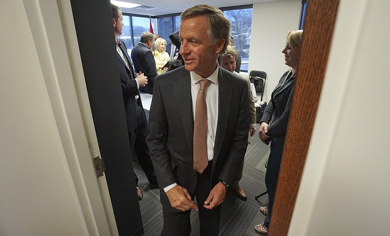 Governor Bill Haslam leaves the Cherokee Health Systems facility after answering questions about his Insure Tennessee plan which could expand Medicare to thousands of people in the state of Tennessee. Governor Haslam spoke while visiting the Cherokee Health Systems office in downtown Chattanooga on Ja. 28, 2015. 