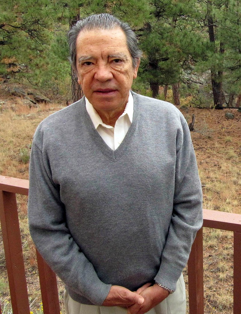 This  2009, file photo shows former Los Alamos National Laboratory nuclear physicist Pedro Leonardo Mascheroni on his back deck in Los Alamos, N.M.  