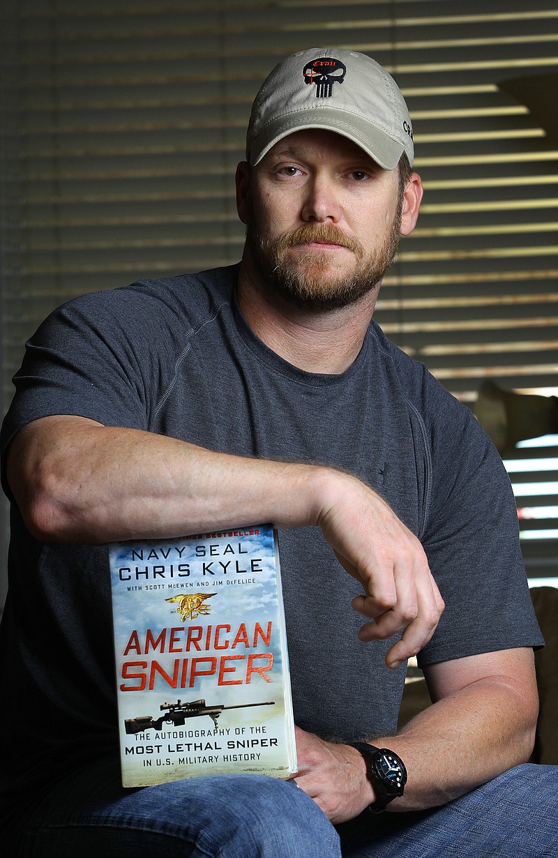 
              FILE In this April 6, 2012, photo, former Navy SEAL and author of the book “American Sniper” poses in Midlothian, Texas. Former Navy SEAL and Minnesota Gov. Jesse Ventura, who won $1.8 million in a defamation lawsuit last year against the estate of the late Chris Kyle, says he won’t see the film partly because Kyle is no hero to him. He tells The Associated Press a hero must be honorable, and there’ no honor in lying. Lyle claimed in his “American Sniper” book that he punched out a man, whom he later identified as Ventura, at a California bar in 2006 for allegedly saying the SEALs "deserve to lose a few" in Iraq. Ventura said it never happened. (AP Photo/The Fort Worth Star-Telegram, Paul Moseley, File)
            