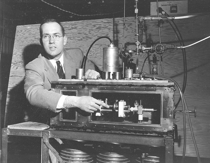 Charles Hard Townes, Columbia University professor and Nobel laureate, explains his invention the maser during a news conference in New York City in this 1955 file photo.
