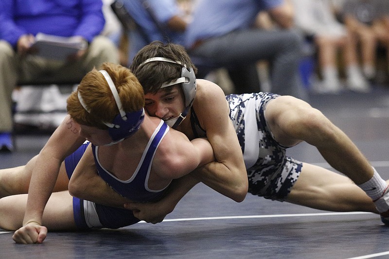 Gordon Lee's Chase Weber, right, wrestles Model's Walker Byrdat Gordon Lee High School in this Jan. 10, 2015, photo.