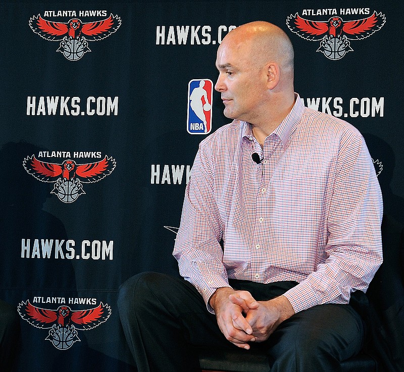 
              FILE - In this May 29, 2013, file photo, Atlanta Hawks general managerr Danny Ferry waits during a news conference in Atlanta.   Ferry can only watch from afar, perhaps taking some satisfaction that the team he put together is the biggest surprise in the NBA. Racially charged comments forced the Hawks general manager to take an indefinite leave, but maybe it's time to recognize that he's been punished enough. (AP Photo/David Tulis, File)
            