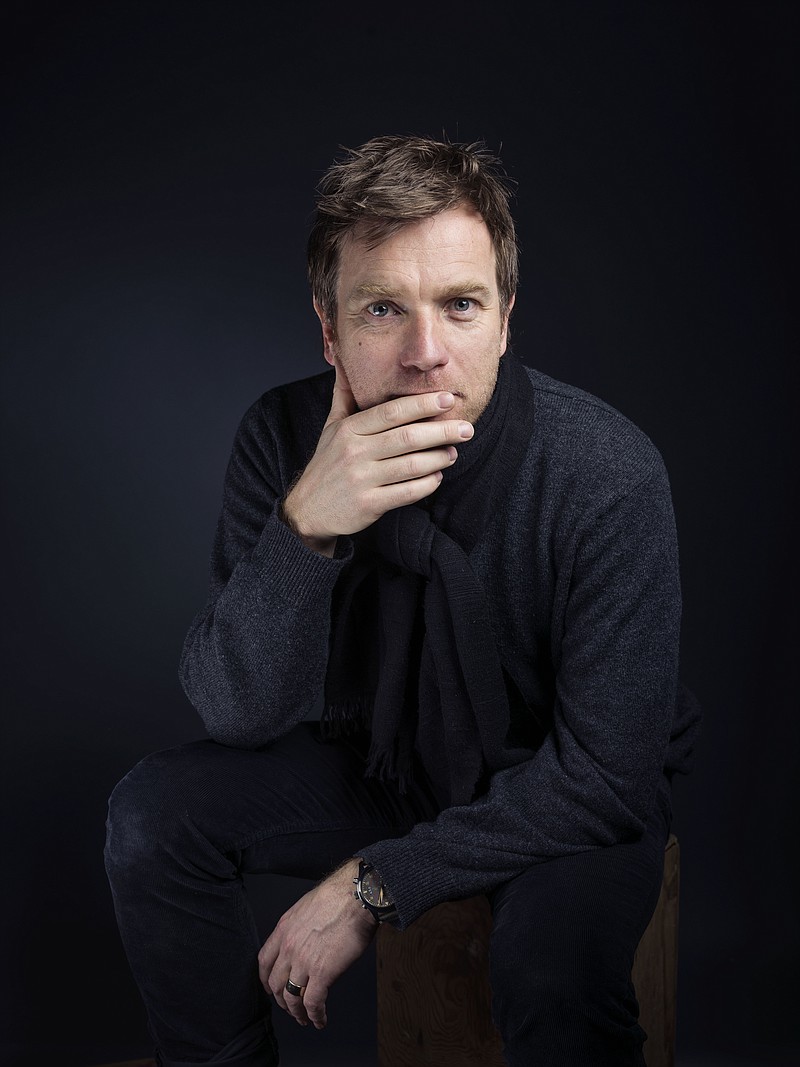 
              Ewan McGregor poses for a portrait to promote the film, "Last Days in the Desert", at the Eddie Bauer Adventure House during the Sundance Film Festival on Sunday, Jan. 25, 2015, in Park City, Utah. (Photo by Victoria Will/Invision/AP)
            