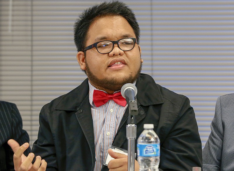 
              In this Monday, Jan. 26, 2015 photo, Seth Ronquillo, an undocumented immigrant from the Philippines, participates in a panel discussion on undocumented college students in Los Angeles. Asians have been slower to sign up for President Barack Obama’s reprieve for young immigrants in the country illegally, and community advocates are ramping up efforts to reach thousands more who are eligible for his expanded immigration plan. Ronquillo, a 22-year-old community health advocate, said he felt he had nothing to lose when he applied since he had virtually no hope of putting his college degree to use upon graduation because of his immigration status. (AP Photo/Nick Ut)
            