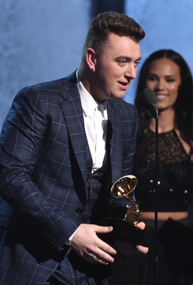 
              Sam Smith accepts the award for song of the year for “Stay With Me” at the 57th annual Grammy Awards on Sunday, Feb. 8, 2015, in Los Angeles. (Photo by John Shearer/Invision/AP)
            