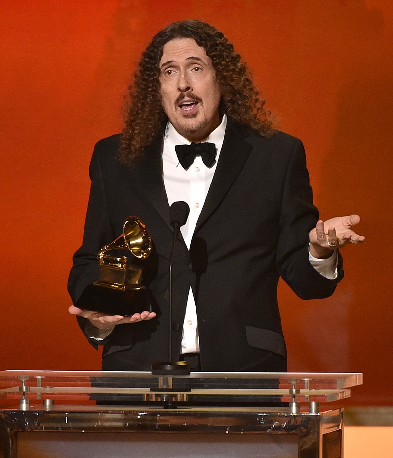 
              "Weird Al" Yankovic accepts the award for best comedy album for “Mandatory Fun” at the 57th annual Grammy Awards on Sunday, Feb. 8, 2015, in Los Angeles. (Photo by John Shearer/Invision/AP)
            