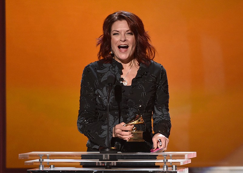 
              Rosanne Cash accepts the award for best american roots song for “A Feather's Not A Bird” at the 57th annual Grammy Awards on Sunday, Feb. 8, 2015, in Los Angeles. (Photo by John Shearer/Invision/AP)
            