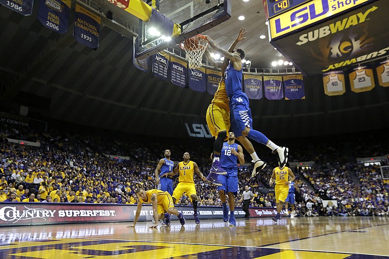 Kentucky forward Willie Cauley-Stein (15) slam dunks in hisgame against LSU in Baton Rouge, La., in this Feb. 10, 2015, file photo. 