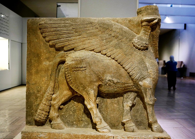 A winged bull made out of limestone displayed at the Iraqi National Museum in Baghdad in this 2014 photo.