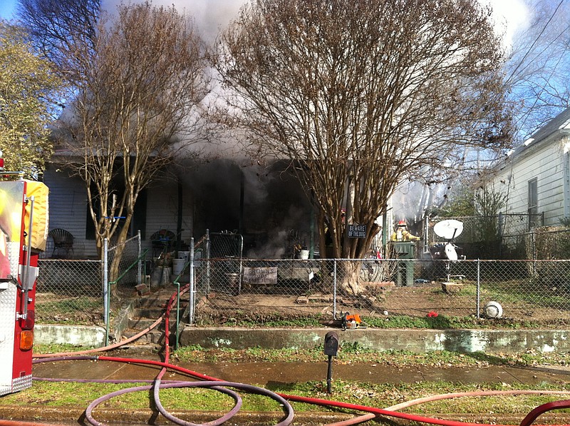 Chattanooga firefighters work to extinguish a fire at 2005 E. 12th Street. 