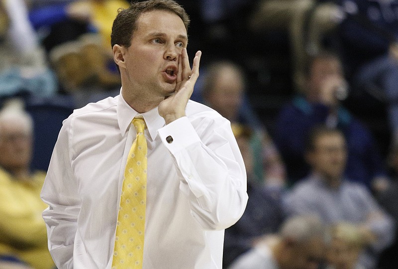 UTC men's basketball coach Will Wade directs players during the Mocs' SoCon basketball game against the UNCG Spartans on Jan. 24, 2015, at McKenzie Arena in Chattanooga.