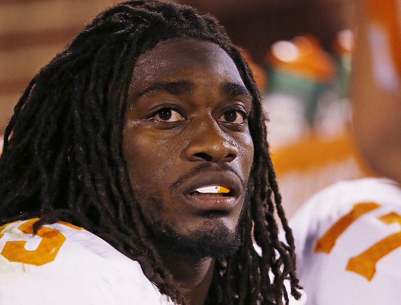 This Sept. 13, 2014, file photo shows Tennessee linebacker A.J. Johnson (45) during an NCAA college football game between Tennessee and Oklahoma in Norman, Okla. 