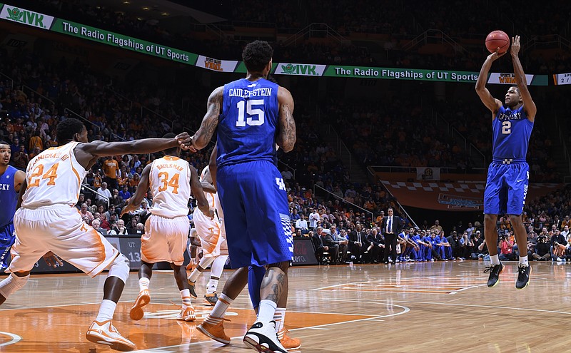 Kentucky's Aaron Harrison (2) shoots against Tennessee in the first half of an NCAA college basketball game Tuesday, Feb. 17, 2015, in Knoxville.