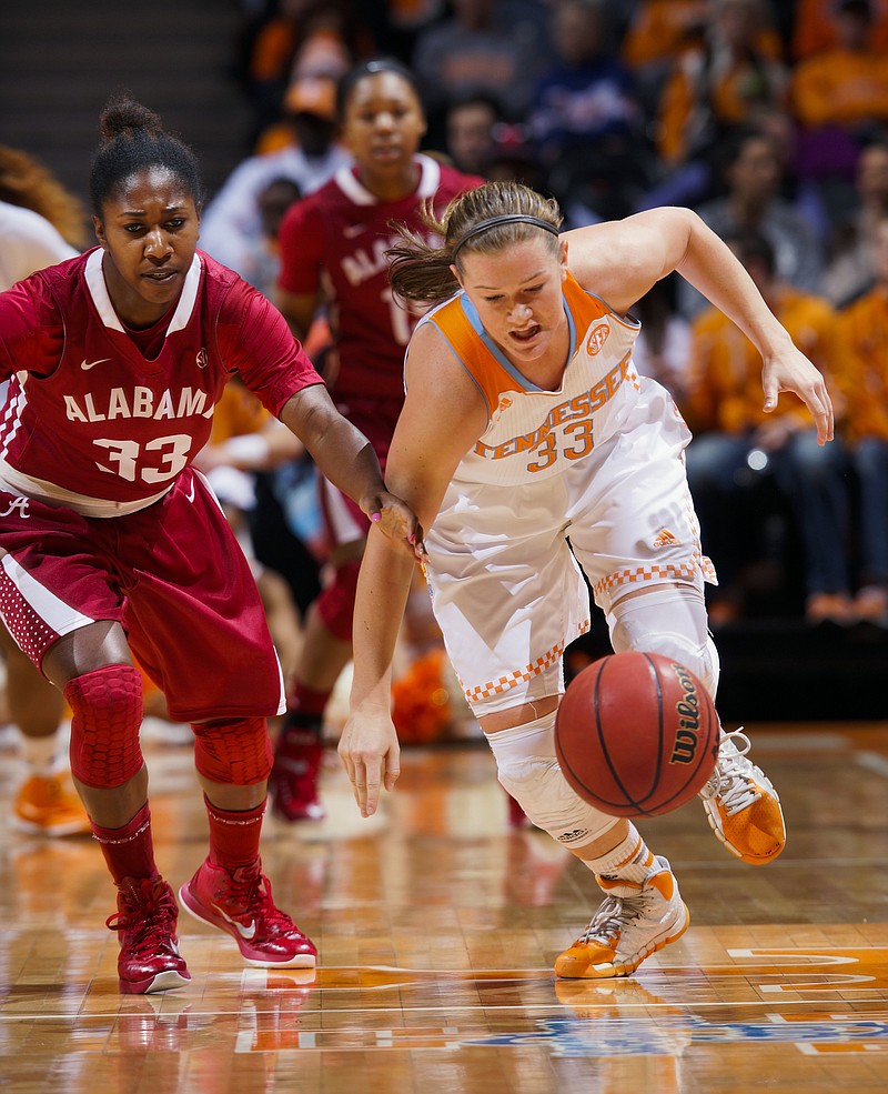 Tennessee's Alexa Middleton (33) right, steals the ball from Alabama's Sharin Rivers (33) left, in the first half of an NCAA college basketball game Thursday, Feb. 19, 2015, in Knoxville.