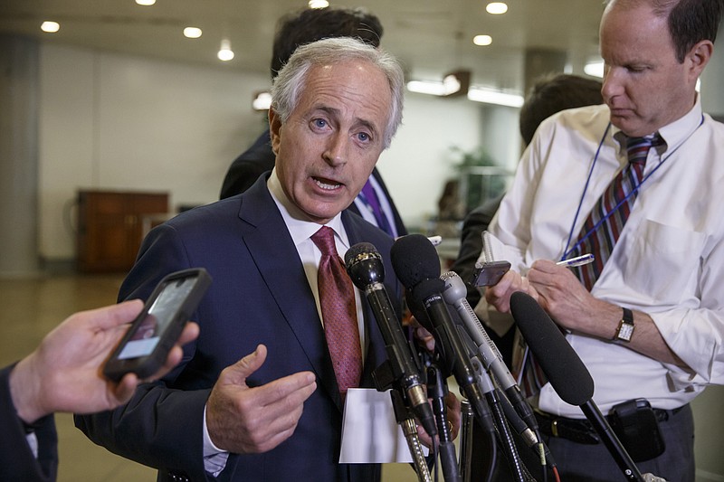 
              FILE - In this Feb. 10, 2015 file photo, Senate Foreign Relations Committee Chairman Sen. Bob Corker, R-Tenn. speaks to reporters on Capitol Hill in Washington. Two years ago, Corker wondered aloud whether the standstill Senate was worth a grown man’s time. But Republicans’ political fortunes in last November’s elections and brutal terrorism overseas have put the two-term Tennessee lawmaker in the chairmanship of the storied Foreign Relations Committee and in charge of the weightiest choices to ever face lawmakers: whether to vote to authorize war. The high-stakes role of negotiating President Barack Obama’s request for new authority to destroy Islamic state militants is a test for the affable businessman and former Chattanooga mayor.  (AP Photo/J. Scott Applewhite, File)
            