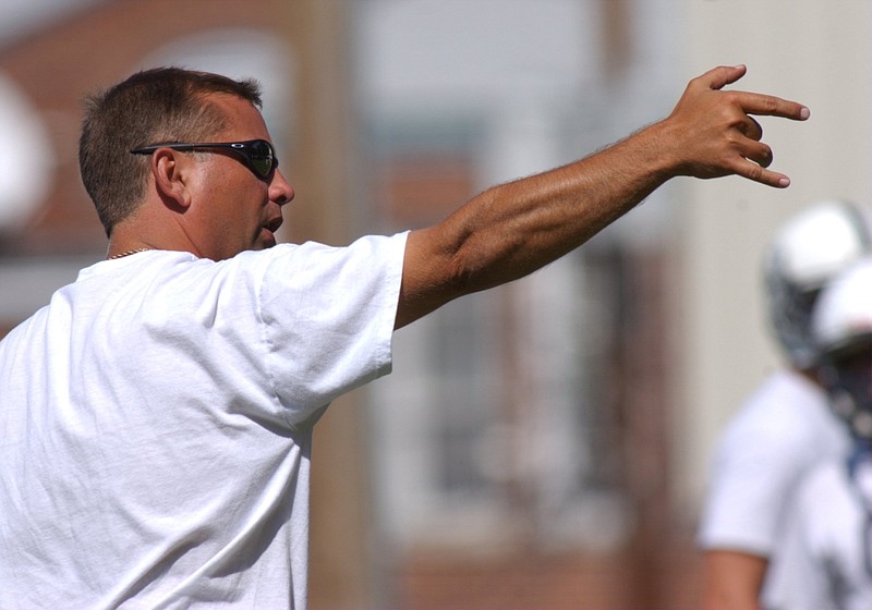 Gordon Lee head coach Greg Ellis directs his men during practice in August, 2004. After leaving in 2005, he has been named head coach, again, for the Trojans. 