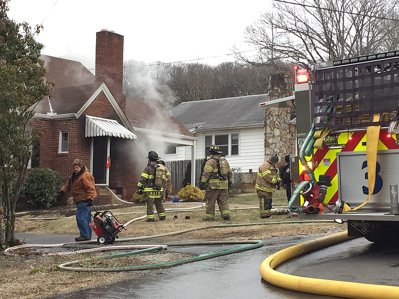 Firefighters respond to a house fire at 117 Narragansette Avenue in Red Bank.
