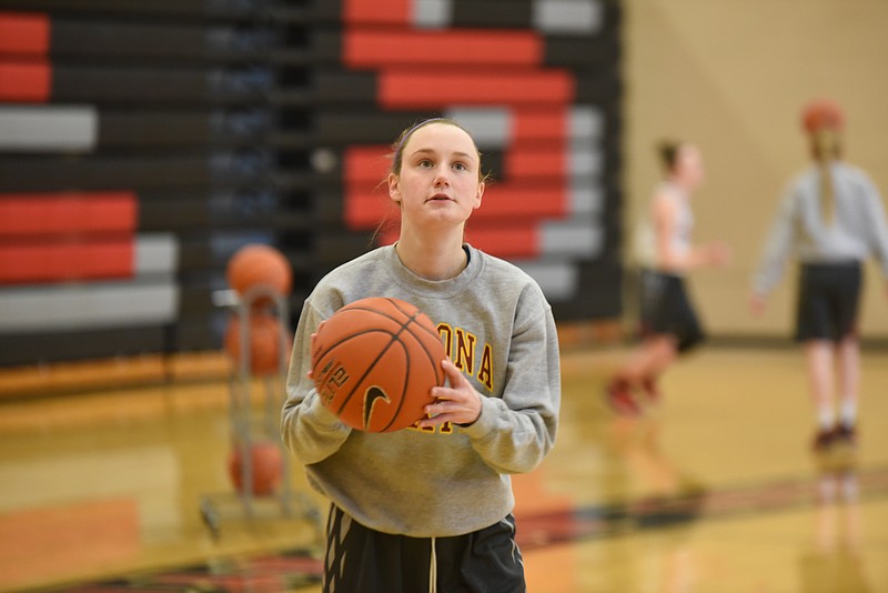 Aryn Sanders, Signal Mountain point guard, warms up shooting 30-points worth of jump shots during practice Thursday. Sanders is currently the area's leading scorer.