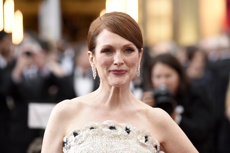 
              Julianne Moore arrives at the Oscars on Sunday, Feb. 22, 2015, at the Dolby Theatre in Los Angeles. (Photo by Chris Pizzello/Invision/AP)
            