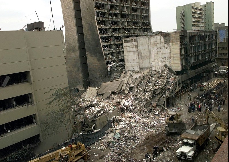 In this Aug. 8, 1998, file photo, the United States Embassy, left, and other damaged buildings in downtown Nairobi, Kenya, are shown on the day after it was bombed by terrorists.