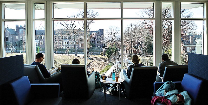 UTC students study in a room with a view at the new UTC library recently. An increase in out-of-state students is just one option in a plan to fix the "broken" funding model for the University of Tennessee.