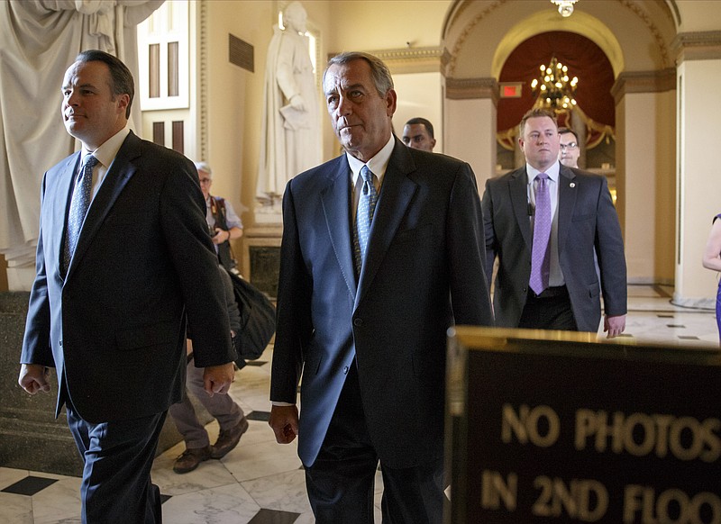 Speaker of the House John Boehner, R-Ohio, walks to the chamber at the Capitol in Washington, Friday evening, Feb. 27, 2015. 