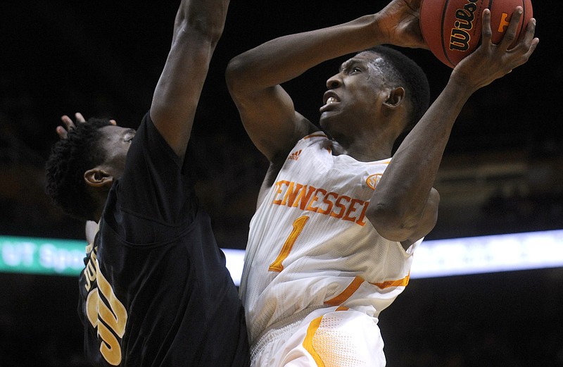 Tennessee guard Josh Richardson (1) shoots during their game on Feb. 26, 2015, in Knoxville.
