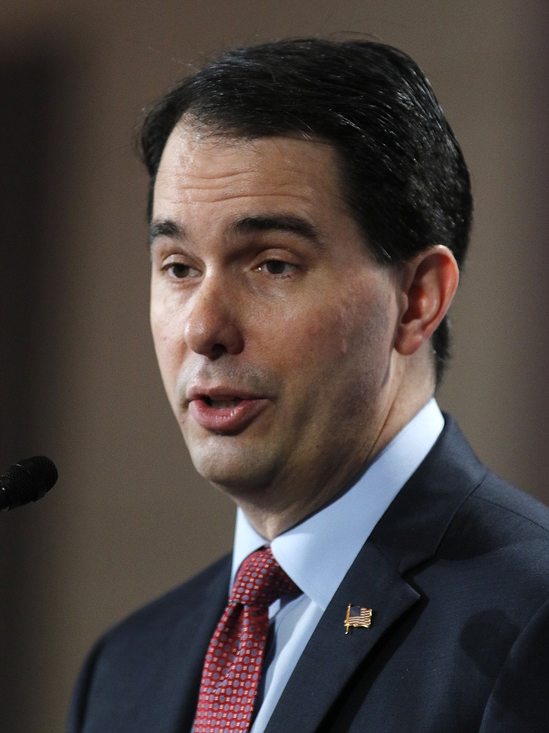 
              Wisconsin Gov. Scott Walker speaks at the winter meeting of the free market Club for Growth winter economic conference at the Breakers Hotel Saturday, Feb. 28, 2015, in Palm Beach, Fla.  (AP Photo/Joe Skipper)
            