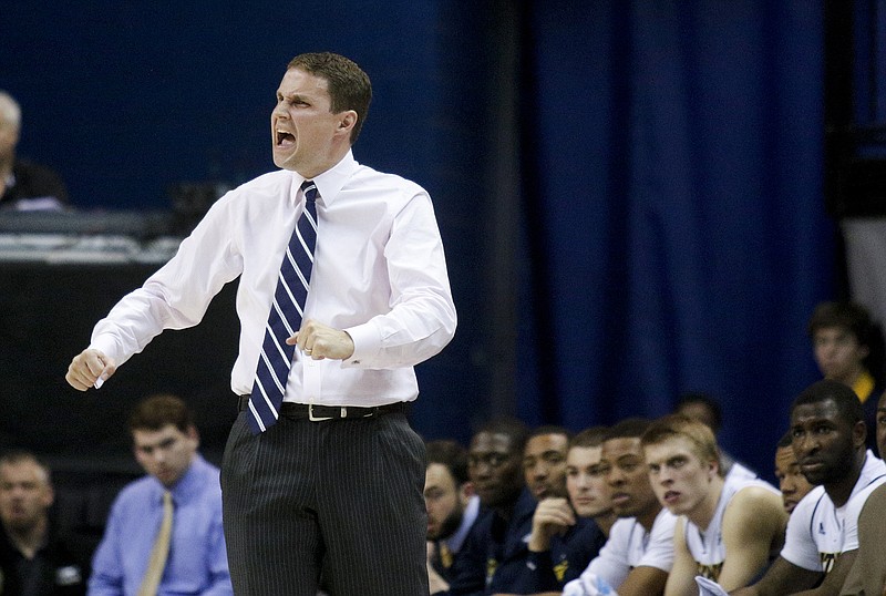 UTC men's basketball coach Will Wade shouts at an official after a call during the Mocs' Senior Night SoCon basketball game against the ETSU Buccaneers on Feb. 21, 2015, at McKenzie Arena in Chattanooga.