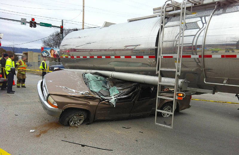 Emergency workers are at the scene of an accident between a pickup truck and a tanker truck at the intersection of 25th and South Broad Streets in Chattanooga. The driver of the pickup was able to crawl out of his vehicle, suffering only minor injuries. 