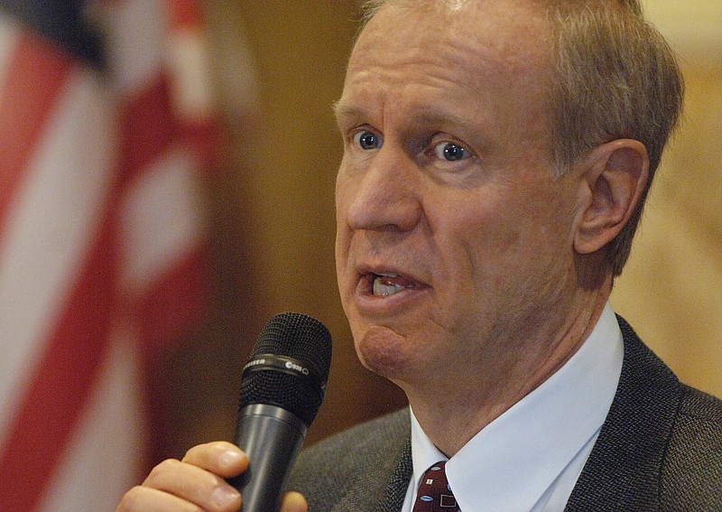 
              Gov. Bruce Rauner speaks at the Mundelein Vernon Hills Rotary Club meeting Monday, March 2, 2015 at the Dover Straits restaurant in Mundelein, Ill. (AP Photo/Daily Herald, Paul Valade) MANDATORY CREDIT, MAGS OUT
            