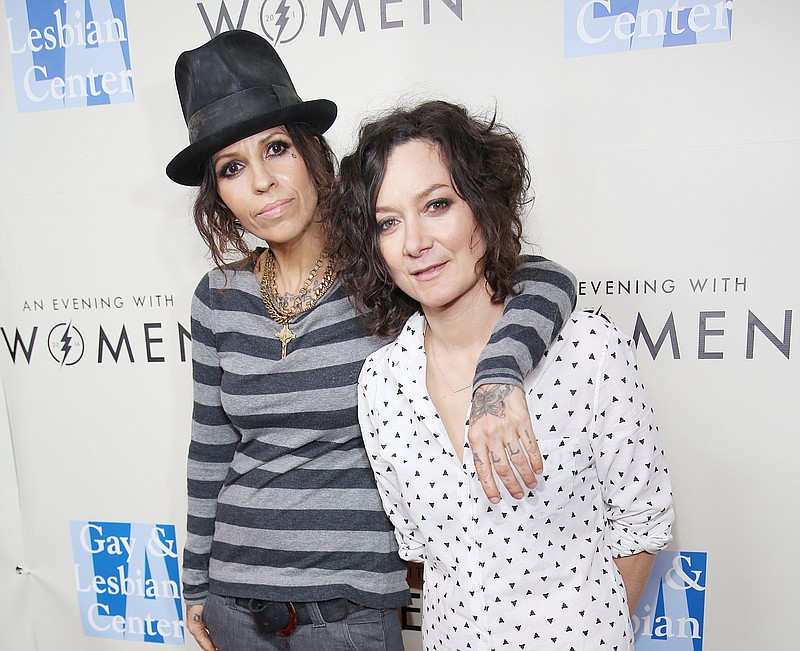 
              FILE - In this March 15, 2014 file photo, Linda Perry, left, and Sara Gilbert arrive at L.A. Gay and Lesbian Center "An Evening with Women" Kick Off Concert Event in West Hollywood, Calif. Gilbert shared the news of her new baby on “The Talk.” Co-host Julie Chen announced on the Monday, March 2, 2015, episode that Gilbert welcomed a son, Rhodes Emilio Gilbert Perry, over the weekend, her first with wife, Perry. (Photo by Annie I. Bang /Invision/AP, File)
            