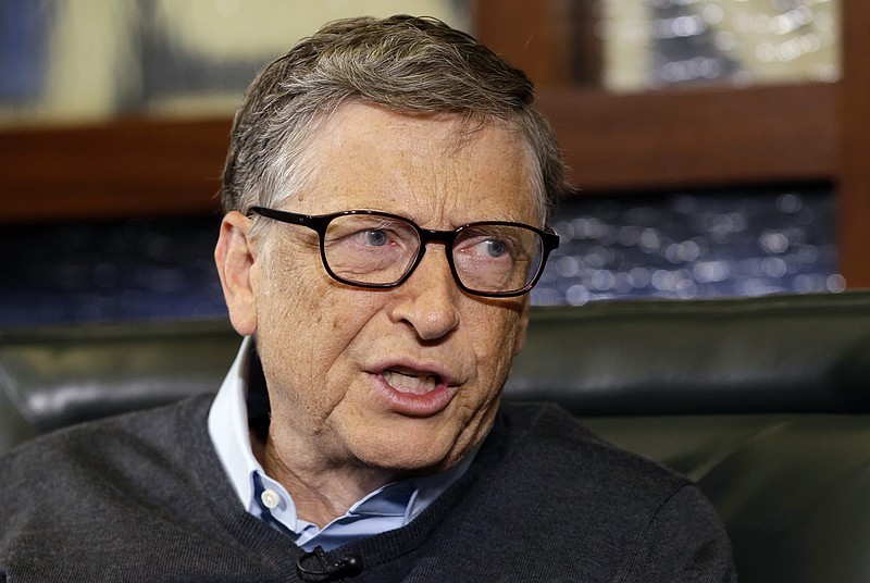 In this May 5, 2014, file photo, Microsoft co-founder and Berkshire Hathaway board member Bill Gates speaks during an interview with Liz Claman on the Fox Business Network in Omaha, Neb.