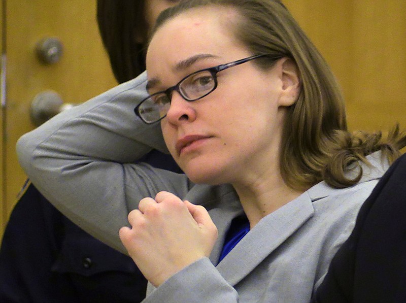 In this Feb. 3, 2015, file photo, defendant Lacey Spears brushes her hair back during the opening statements portion of her murder trial at the Westchester County Courthouse in White Plains, N.Y.