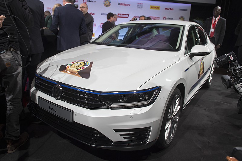 The New Volkswagen Passat, the car of the Year 2015, is on display during the award ceremony ahead of the Geneva Motor Show in Geneva, Switzerland, Monday, March 2, 2015. 