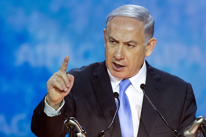 Israeli Prime Minister Benjamin Netanyahu gestures while addressing the 2015 American Israel Public Affairs Committee (AIPAC) Policy Conference in Washington on Monday, March 2, 2015.