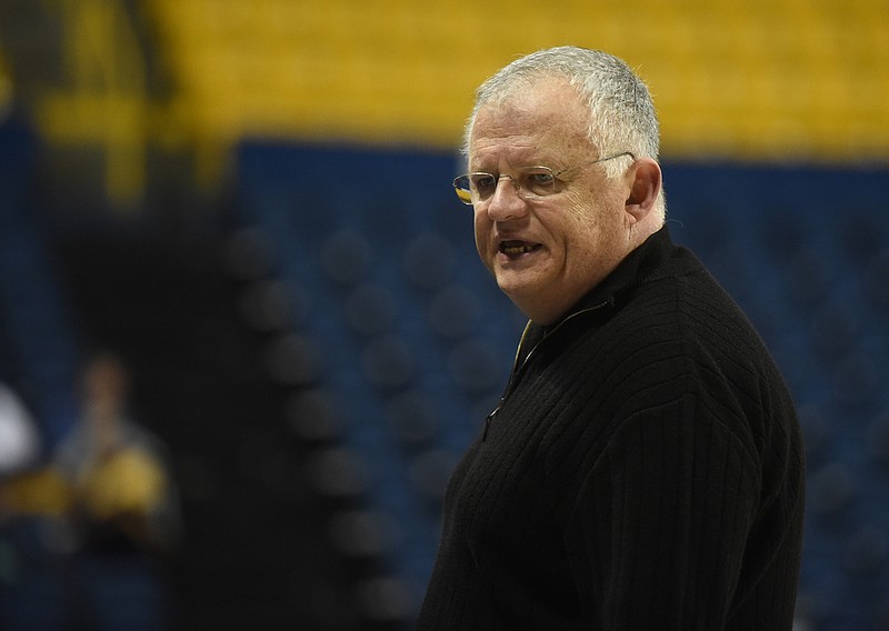 UTC coach Jim Foster calls a player to the court during the game against Wofford at McKenzie Arena.