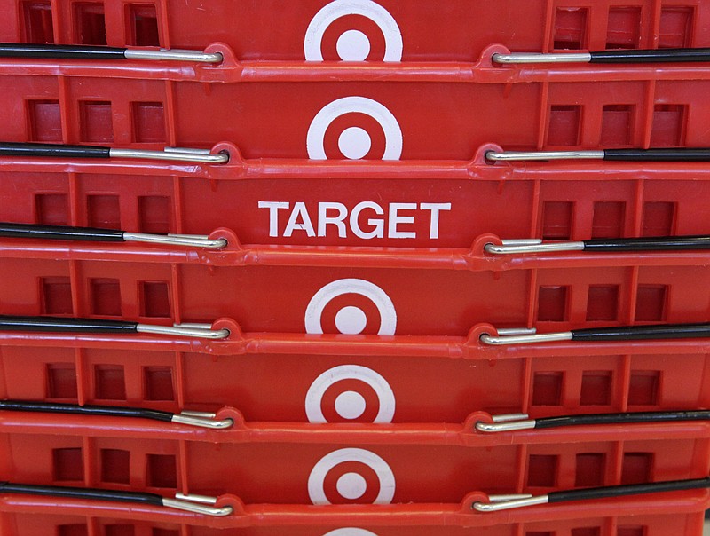 
              FILE - In this May 20, 2009 file photo, shopping baskets are stacked at a Chicago area Target store. Target Corp. on Tuesday, March 3, 2015 said it plans $2 billion in cost cuts over the next two years through corporate restructuring and other improvements. (AP Photo/Charles Rex Arbogast, File)
            