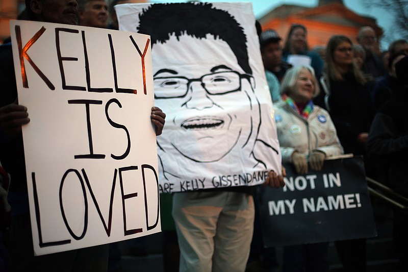 
              Death penalty opponents gather on the steps of the State Capitol in Atlanta, Ga., Monday, March 2, 2015 to protest the death penalty and the planned execution of Kelly Gissendaner. (AP Photo/Atlanta Journal-Constitution, Ben Gray)
            