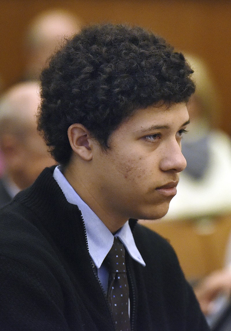 
              FILE - In this Jan. 9, 2015, file photo, Philip Chism sits in Salem Superior Court, in Salem, Mass., during a hearing. A Massachusetts judge has ruled that Chism's confession to police that he killed his math teacher cannot be used in his murder trial. Judge David Lowy's ruling came Tuesday, March 3, 2015, in the case of 16-year-old Chism. He has pleaded not guilty to killing and raping 24-year-old Colleen Ritzer on school grounds in October 2013. (AP Photo/The Boston Herald, Patrick Whittemore, Pool, File)
            