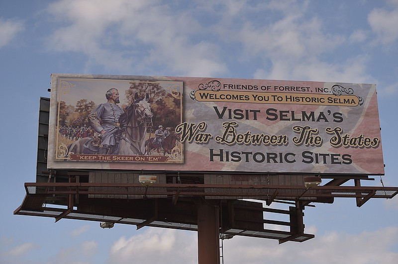 A billboard near the Edmund Pettus Bridge in Selma, Alabama, bears an image of Confederate general and Ku Klux Klan founder Nathan Bedford Forrest. The ad put up days ago by a group dedicated to honoring Forrest invites visitors to see Selma's "War Between the States" historic sites Tuesday, March 3, 2015, in Selma, Ala. 