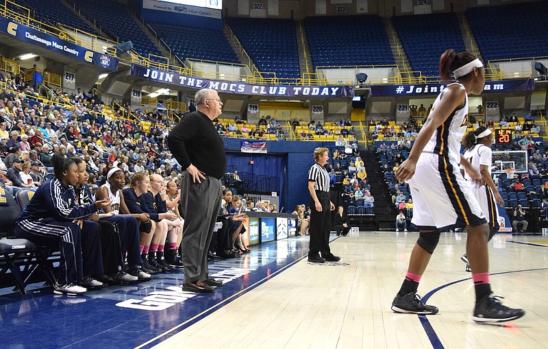 UTC head coach Jim Foster watches the game in McKenzie Arena in this Feb. 28, 2015, photo. 